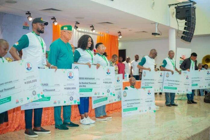 Akwa Ibom Governor, Umo Eno during presentation of N400M grant to the 800 beneficiaries of State Government entrepreneurial programmes.